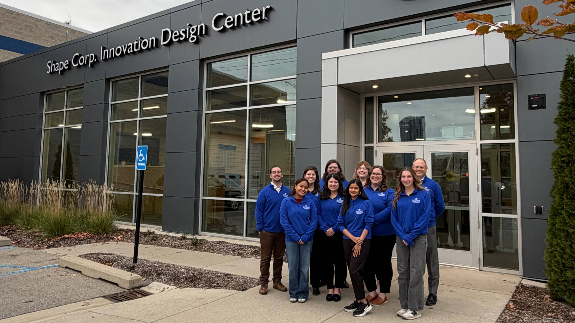 PCE Advising team posing outside of Innovation Design Center